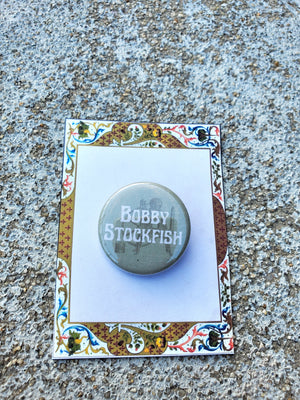 URINETOWN "Bobby Stockfish" Metal Pinback Pin URINETOWN "Bobby Stockfish" Metal Pinback Pin