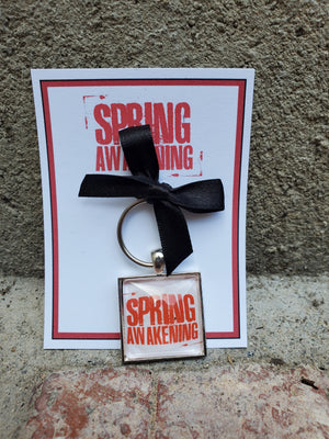 SPRING AWAKENING "Show" Glass Cabachon Keychain SPRING AWAKENING "Show" Glass Cabachon Keychain