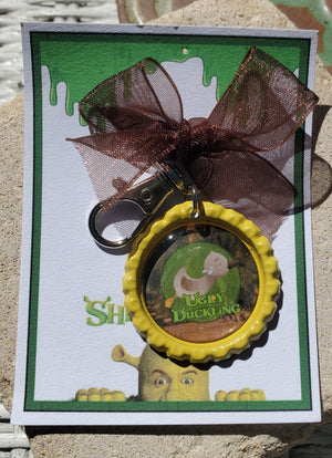 SHREK "Hässliches Entlein" Flaschenverschluss-Schlüsselanhänger SHREK "Hässliches Entlein" Flaschenverschluss-Schlüsselanhänger