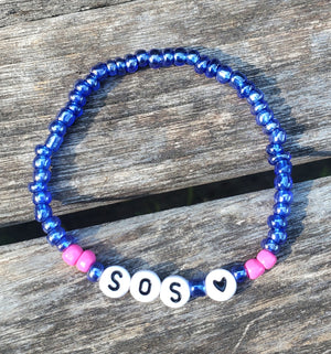 MAMMA MIA „SOS“ Perlen-Buchstabenarmband MAMMA MIA „SOS“ Perlen-Buchstabenarmband