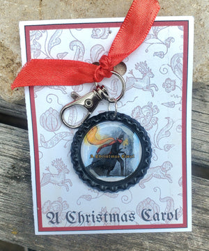 A CHRISTMAS CAROL "Show Logo" Bottlecap Keychain A CHRISTMAS CAROL "Show Logo" Bottlecap Keychain
