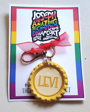 JOSEPH AND THE . . . DREAMCOAT "LEVI" Bottlecap Keychain JOSEPH AND THE . . . DREAMCOAT "LEVI" Bottlecap Keychain