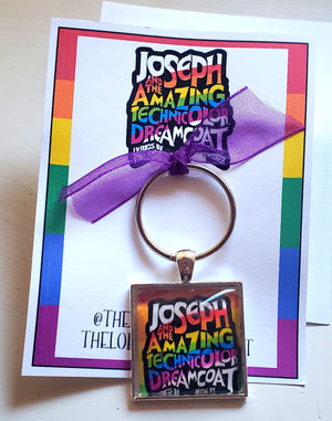JOSEPH AND THE . . . DREAMCOAT "SHOW LOGO" Glass Cabachon Keychain JOSEPH AND THE . . . DREAMCOAT "SHOW LOGO" Glass Cabachon Keychain
