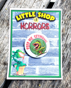 LITTLE SHOP OF HORRORS "Feed Me Seymour" Metal Pinback Button LITTLE SHOP OF HORRORS "Feed Me Seymour" Metal Pinback Button