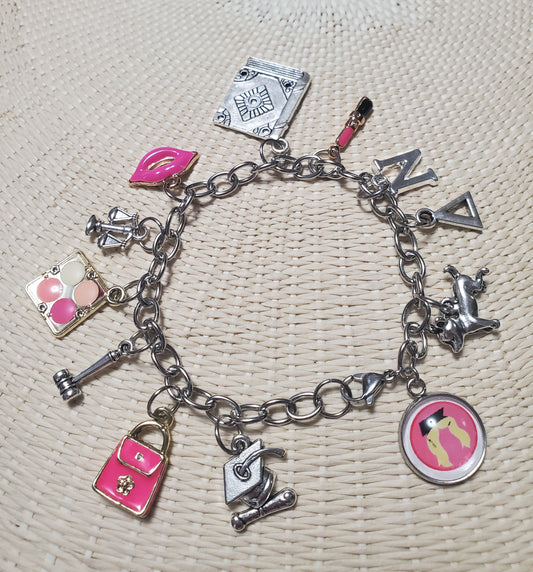 A Legally Blonde Charm Bracelet from The Lobby Boutique with themed merchandise.