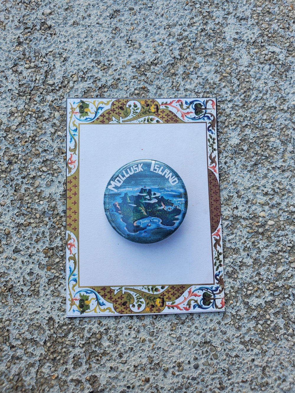 PETER AND STARCATCHER "Mollusk Island" Metal Pinback Button