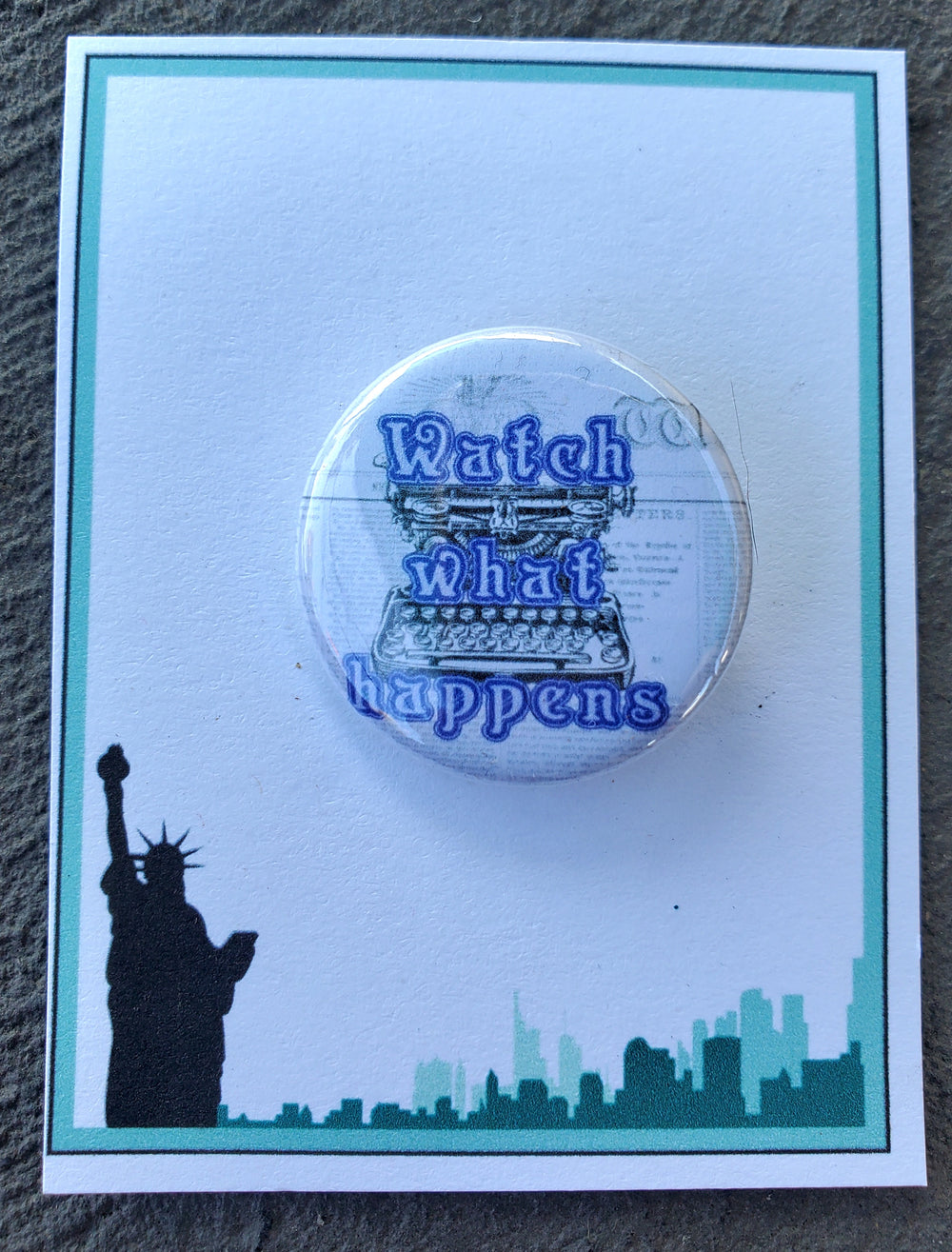 NEWSIES "Watch What Happens" Metall Button