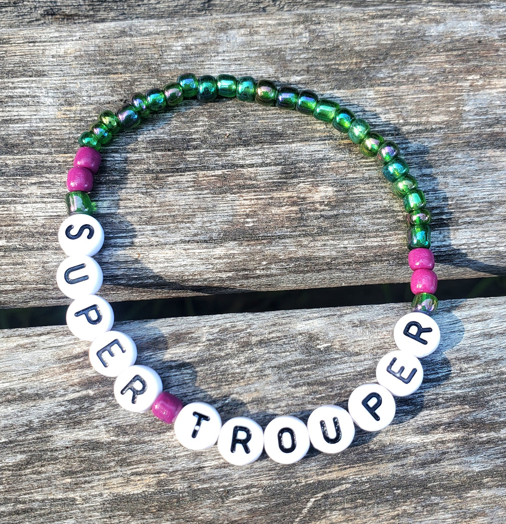 MAMMA MIA „Super Trouper“ Perlen-Buchstabenarmband