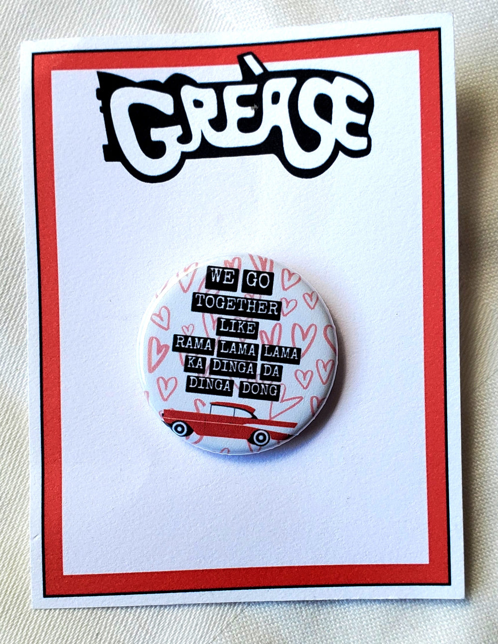GREASE 'Es gibt schlimmere Dinge, die ich tun könnte' Metall Button