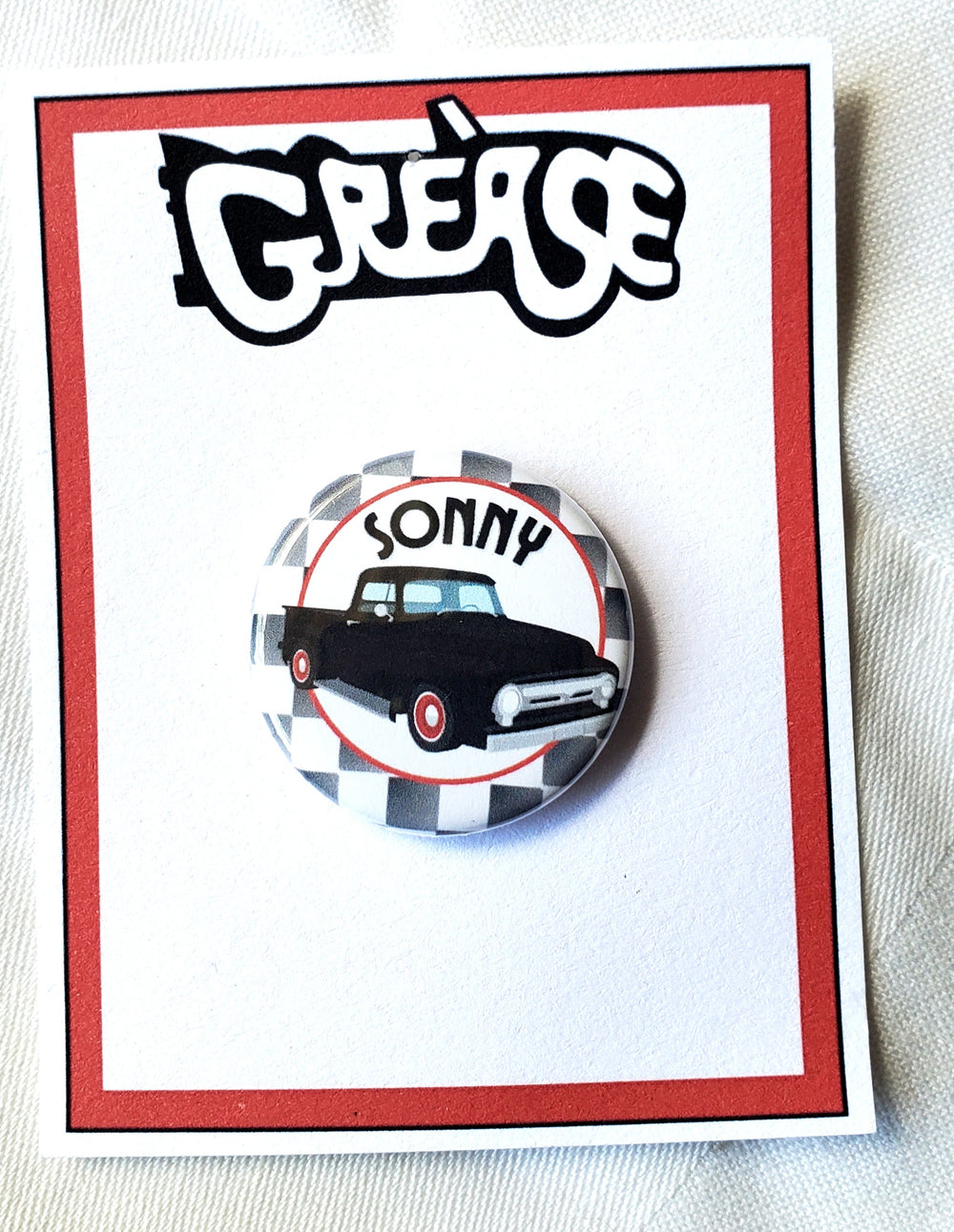 GREASE 'Es gibt schlimmere Dinge, die ich tun könnte' Metall Button