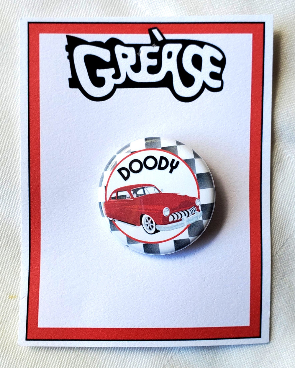 GREASE 'Es gibt schlimmere Dinge, die ich tun könnte' Metall Button