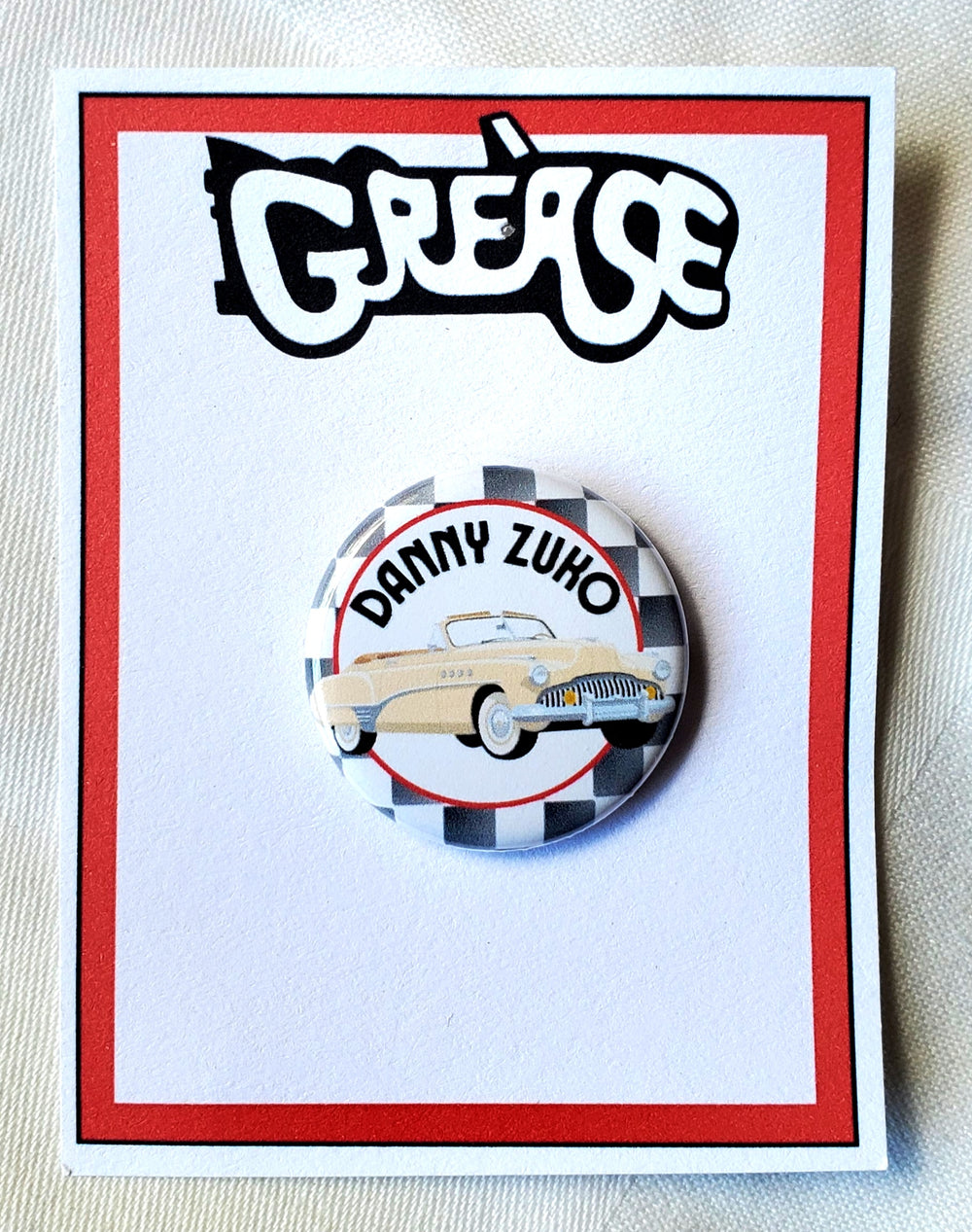 GREASE 'Es gibt schlimmere Dinge, die ich tun könnte' Metall Button
